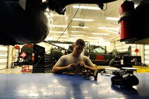 Senior Airman Andrew Kirk, 22nd Logistics Readiness Squadron vehicle maintainer, deconstructs a vehicle part Jan. 8, 2016, at McConnell Air Force Base, Kan. Vehicle maintainers troubleshoot system and repair malfunctions so that the equipment can return to the fleet operating efficiently. (U.S. Air Force photo/Airman Jenna K. Caldwell)