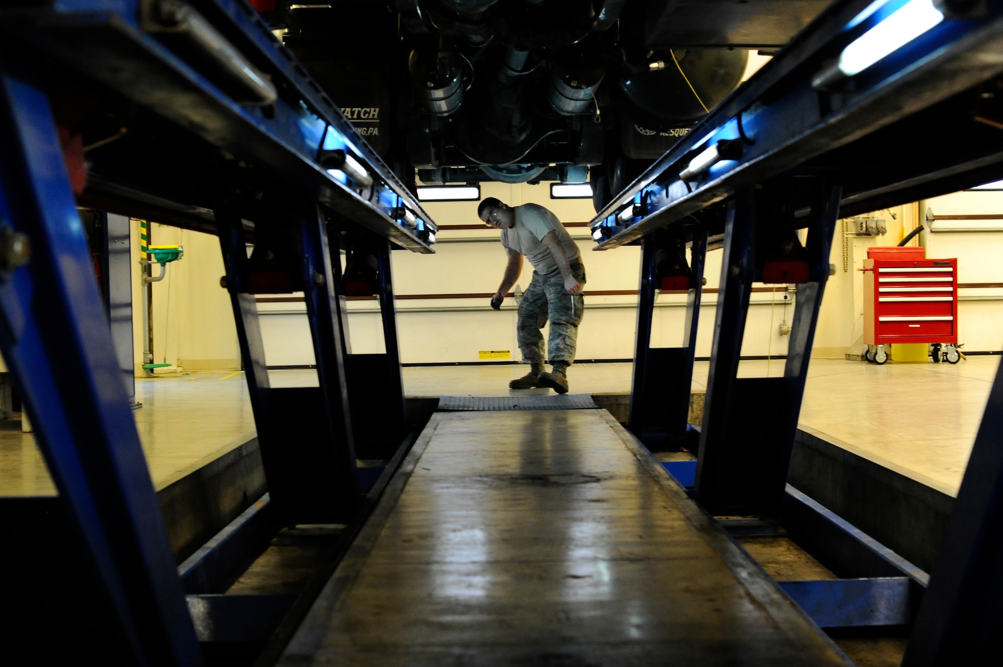Senior Airman Andrew Kirk, 22nd Logistics Readiness Squadron vehicle maintainer, removes a broken part from a vehicle Jan. 8, 2016, at McConnell Air Force Base, Kan. Vehicle Maintainers upkeep the vehicle fleet by replacing broken parts ensures the operator is safe during the performance of the mission. (U.S. Air Force photo/Airman Jenna K. Caldwell)