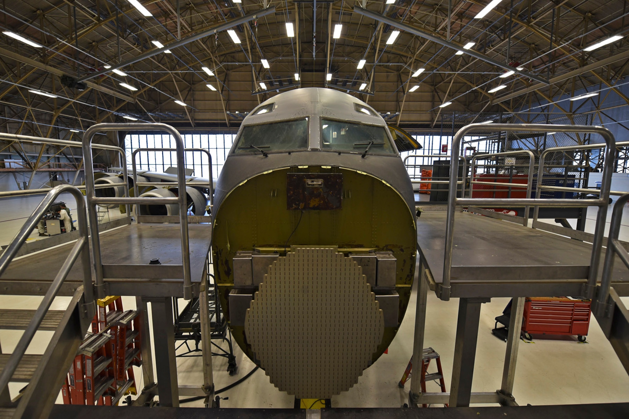 Airmen with the 92nd and 141st Maintenance Squadrons work on a KC-135 Stratotanker during the last Periodic Inspection of the year Dec. 9, 2015, at Fairchild Air Force Base, Wash. During PEs, 16 different Air Force Specialty Codes work together to ensure the inspection phase is completed successfully. These AFSCs include crew chiefs and avionics troops from the 92nd Aircraft Maintenance Squadron. (U.S. Air Force photo/ Airman 1st Class Mackenzie Richardson)