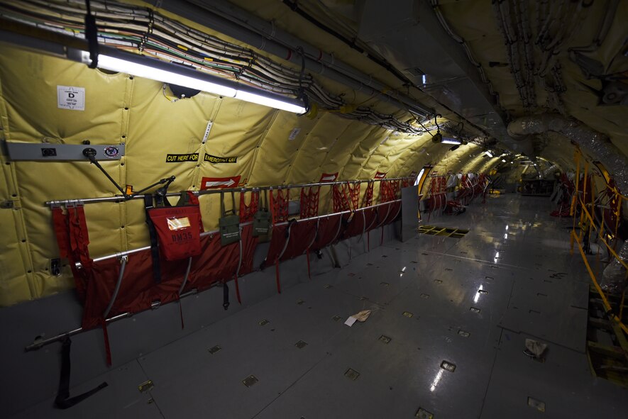 During a Periodic Inspection, the 92nd and 141st Maintenance Squadrons remove all panels from the jet, including the floor boards. This allows Airmen to work on rigging landing gear and various other controls. The PE is one of the most in-depth and time-consuming inspections done on a jet. (U.S. Air Force photo/ Airman 1st Class Mackenzie Richardson)
