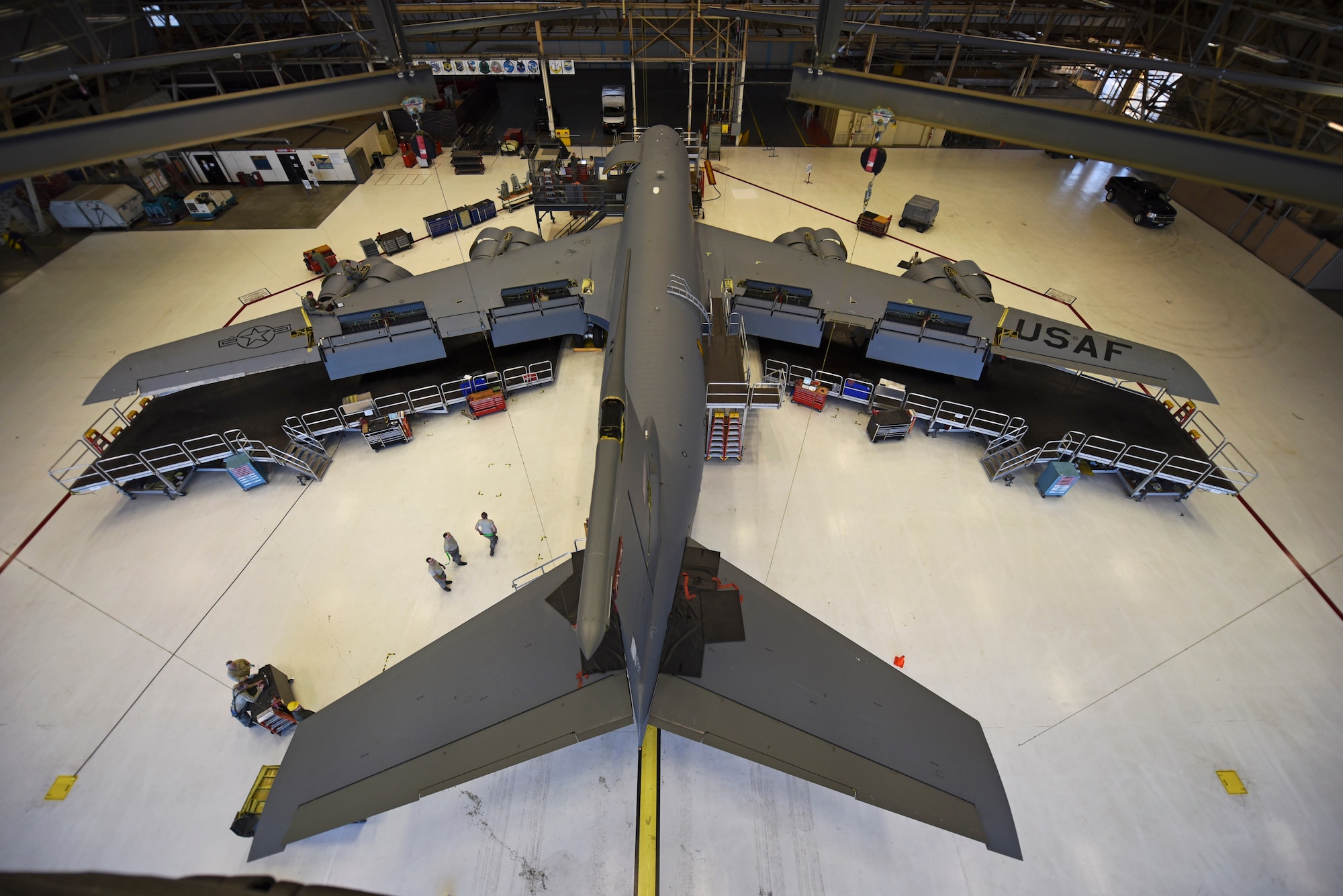 The 92nd and 141st Maintenance Squadrons and the 92nd Aircraft Maintenance Squadron and work on the last Periodic Inspection of the year Dec. 9, 2015, at Fairchild Air Force Base, Wash. During the initial phase of PE, panels are removed from the jet and Airmen look for discrepancies. Approximately 1,200 maintenance actions are found and completed throughout every PE. (U.S. Air Force photo/Airman 1st Class Mackenzie Richardson)