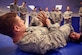 Senior Airman David Hoch, 11th Security Forces Squadron response force leader, applies an arm bar on a classmate during the Basic Combatives Course at Fort Belvoir, Jan. 8, 2016. Students learn more than 30 techniques during the week-long course (U.S. Air Force photo by Senior Airman Mariah Haddenham/Released)