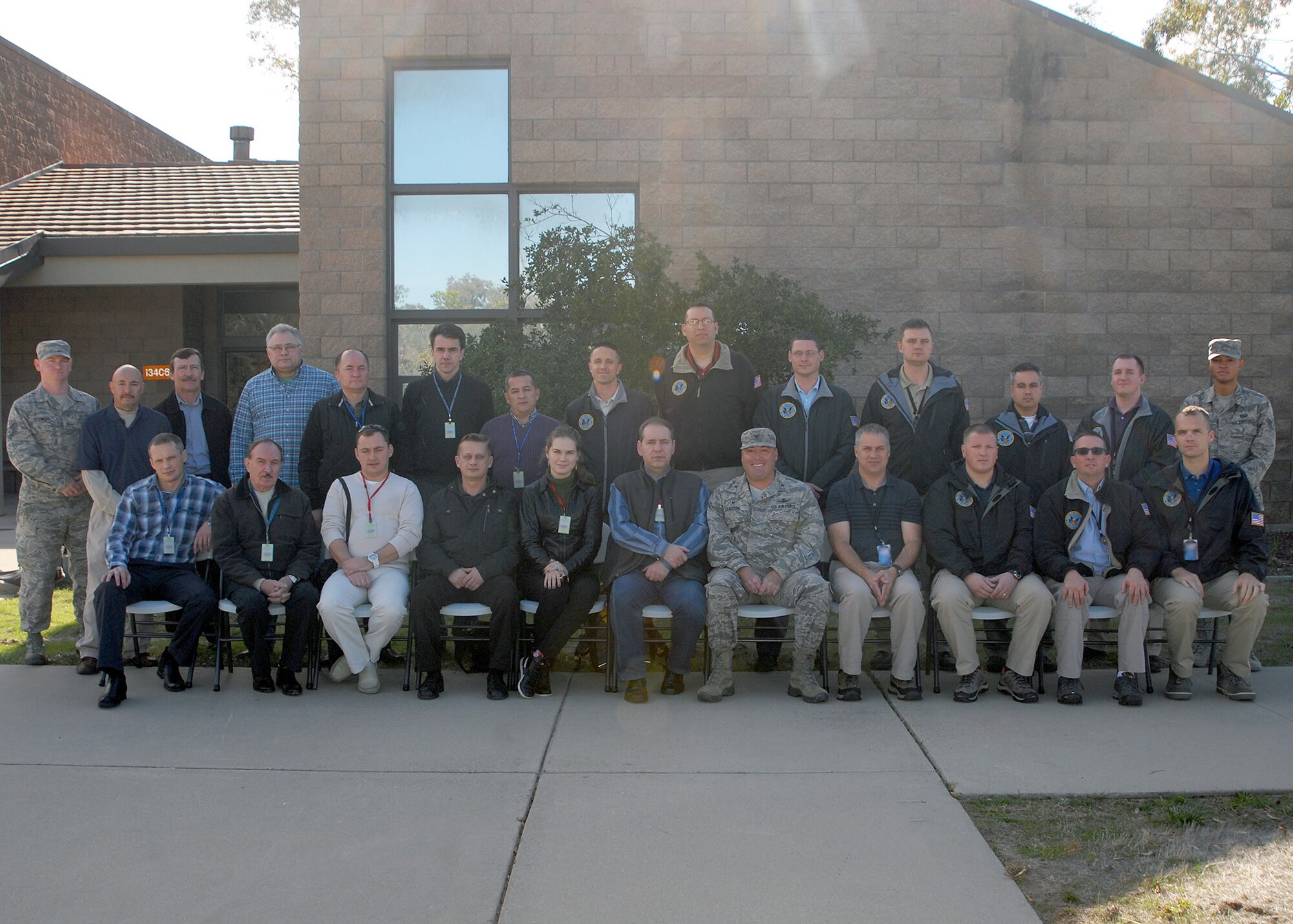 A Strategic Arms Reduction Treaty team from Russia poses for a group photo with members of Vandenberg Air Force Base after completing an on-site verification in compliance with START requirements, Dec. 6, 2015, Vandenberg Air Force Base. START is a bi-lateral treaty between the Russian Federation and the United States, each nation gets 18 inspection quotas per treaty year to continue the strategic arms control process. (U.S. Air Force photo by Senior Airman Kyla Gifford/Released)