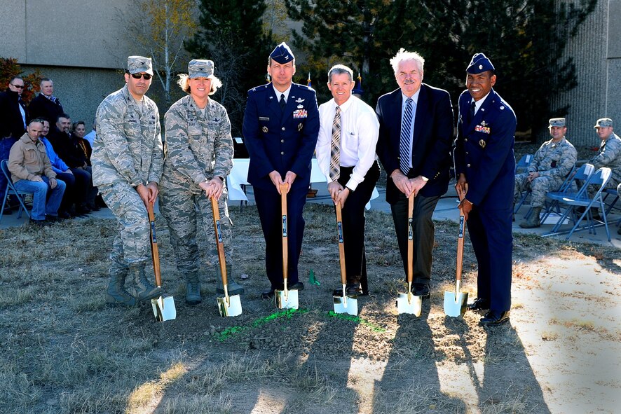 (left to right) Col. Jason Janaros, 50th Mission Support Group commander, Col. DeAnna M. Burt, 50th Space Wing commander, Col. Clint Hunt, Office of Space Launch director, Gary Lund, Office of Space Launch design and construction manager, John Ayer, Tutor Perini senior project manager, and Lt. Col. Marcus Jackson, National Reconnaissance Office Operations Squadron commander, break ground for a new NRO building Tuesday, Nov. 3, 2015, at Schriever Air Force Base, Colorado. (U.S. Air Force photo/Christopher DeWitt)