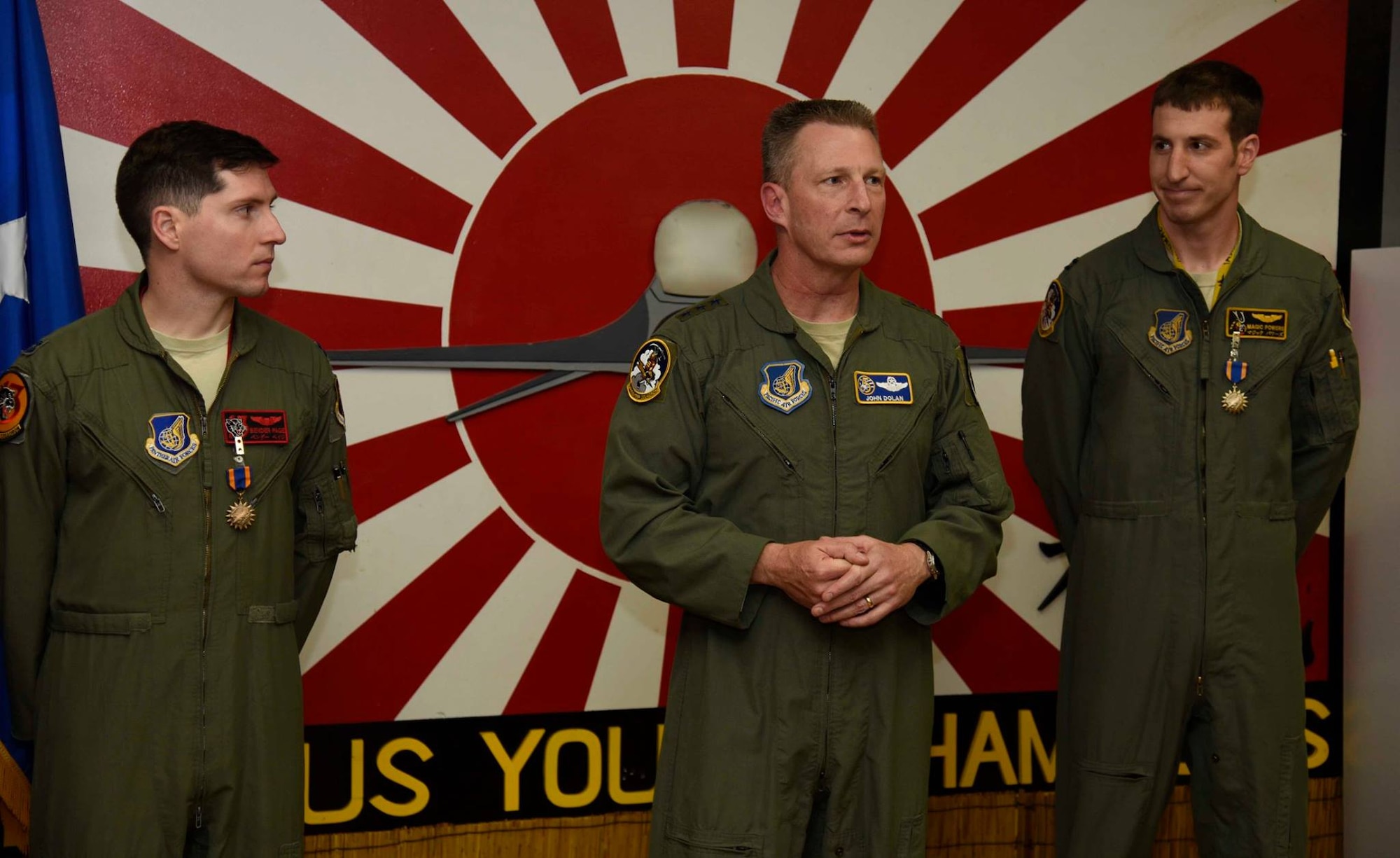 Lt. Gen. John L. Dolan, the commander of U.S. Forces Japan and 5th Air Force, personally congratulates the 14th Fighter Squadron as Pacific Air Forces' Raytheon Trophy nominee after presenting numerous air medals during his visit at Misawa Air Base, Japan, Jan. 5, 2016. Nominees are graded on air defense and air superiority mission performance, operational mission performance, organizational readiness inspection results, training exercise participation, unit and individual achievements and awards. The 14th FS will represent the entire major command, spanning nine bases and dozens of other fighter squadrons across the U.S. Pacific Command area of responsibility. (U.S. Air Force photo by Airman 1st Class Jordyn Fetter)