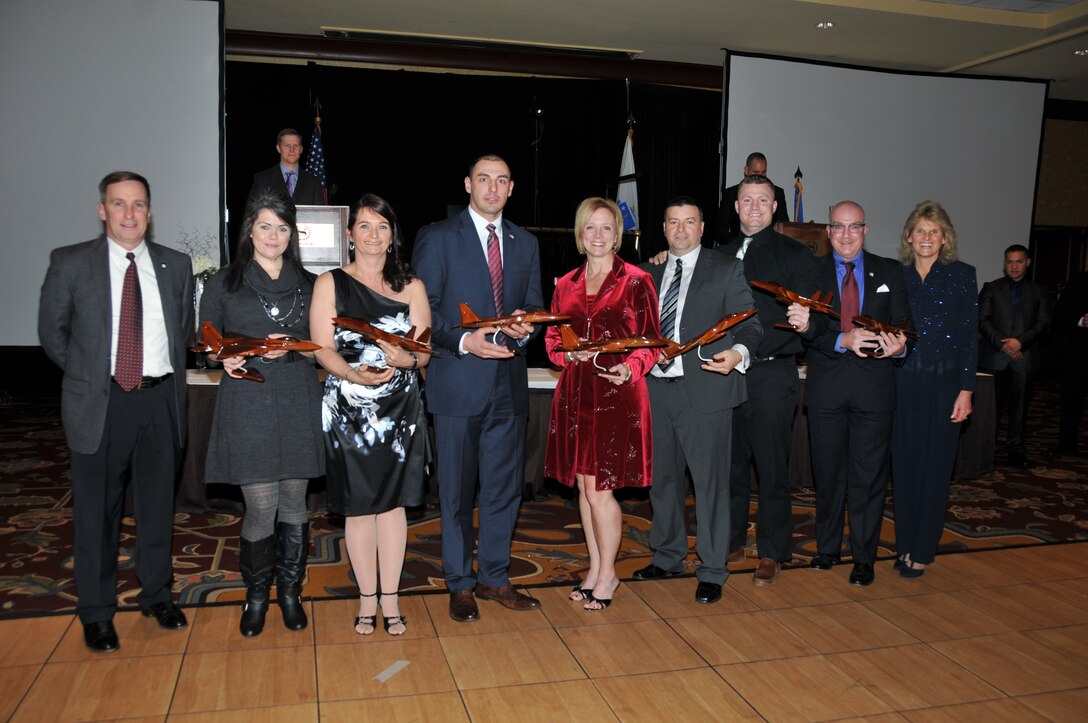 The 104th Fighter Wing recognized its superior performers during the 42nd Annual Awards Ceremony, January 9, 2016 at the Springfield Sheraton, Springfield Mass.  From left to right: Colonel James J. Keefe, Wing Commander for the 104th Fighter Wing; Staff Sgt. Mary Keeler, Active Guard Reserve (AGR)/Technician of the Year; Mrs. Christine B. Bassett, Civilian of the Year; Sgt. Mark A. Giromini, Non-Commissioned Officer of the Year; Capt. Katie Gauvin, Company Grade Officer of the Year; Master Sgt. William Craig, First Sergeant of the Year; Senior Airman Shane T. Coakley, Airman of the Year; Chief Master Sgt. Anthony F. Swana, Senior Non-Commissioned Officer of the Year; Chief Master Sgt. Maryanne Walts, Command Chief of 104th Fighter Wing.  (U.S. Air National Guard photo by Maj. Mary Harrington).  
