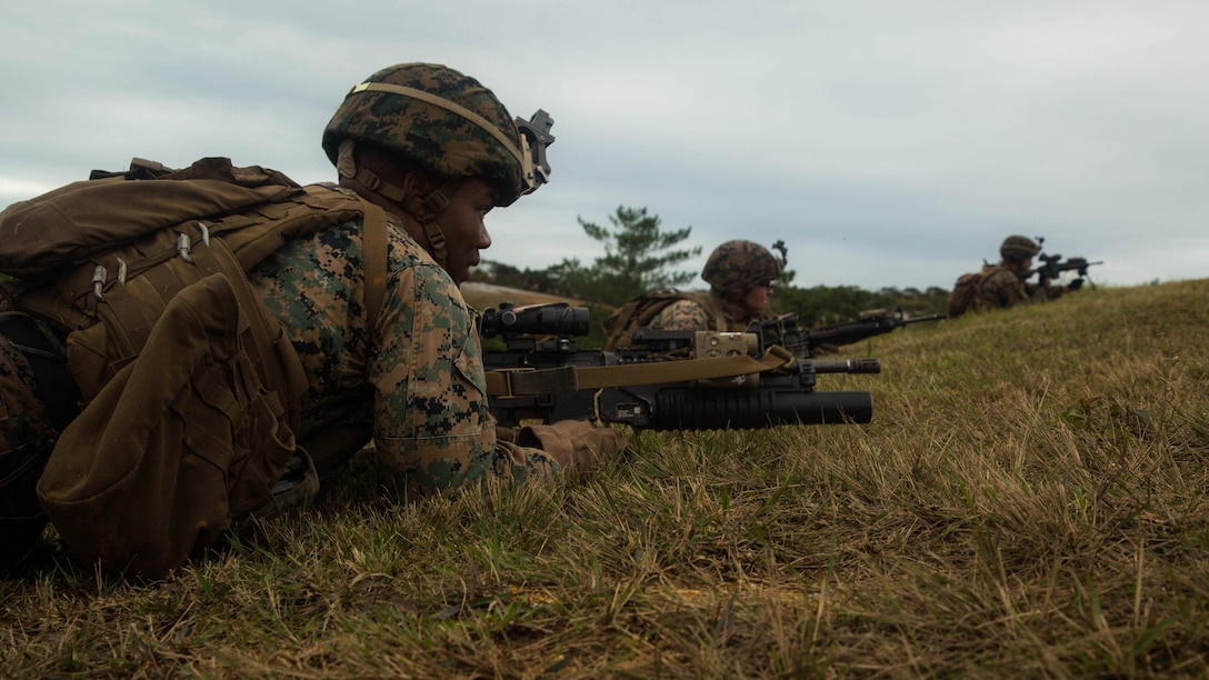 Marines get set to perform buddy rushes during squad attack training on Camp Schwab in Okinawa, Japan, Jan. 6, 2016. Marines with Bravo Company, Battalion Landing Team 1st Battalion, 5th Marines, 31st Marine Expeditionary Unit, conducted squad attack training in preparation for the MEU’s upcoming spring deployment. 