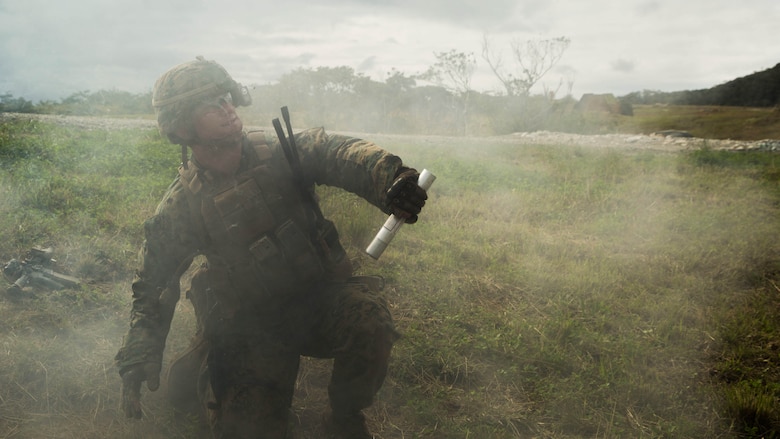 A Marine with Bravo Company, Battalion Landing Team 1st Battalion, 5th Marines, 31st Marine Expeditionary Unit, fires a flare during squad attack training on Camp Schwab in Okinawa, Japan, Jan. 6, 2016. Marines with Bravo Co., BLT 1/5, 31st MEU, conducted squad attack training in preparation for the MEU’s upcoming spring deployment. 