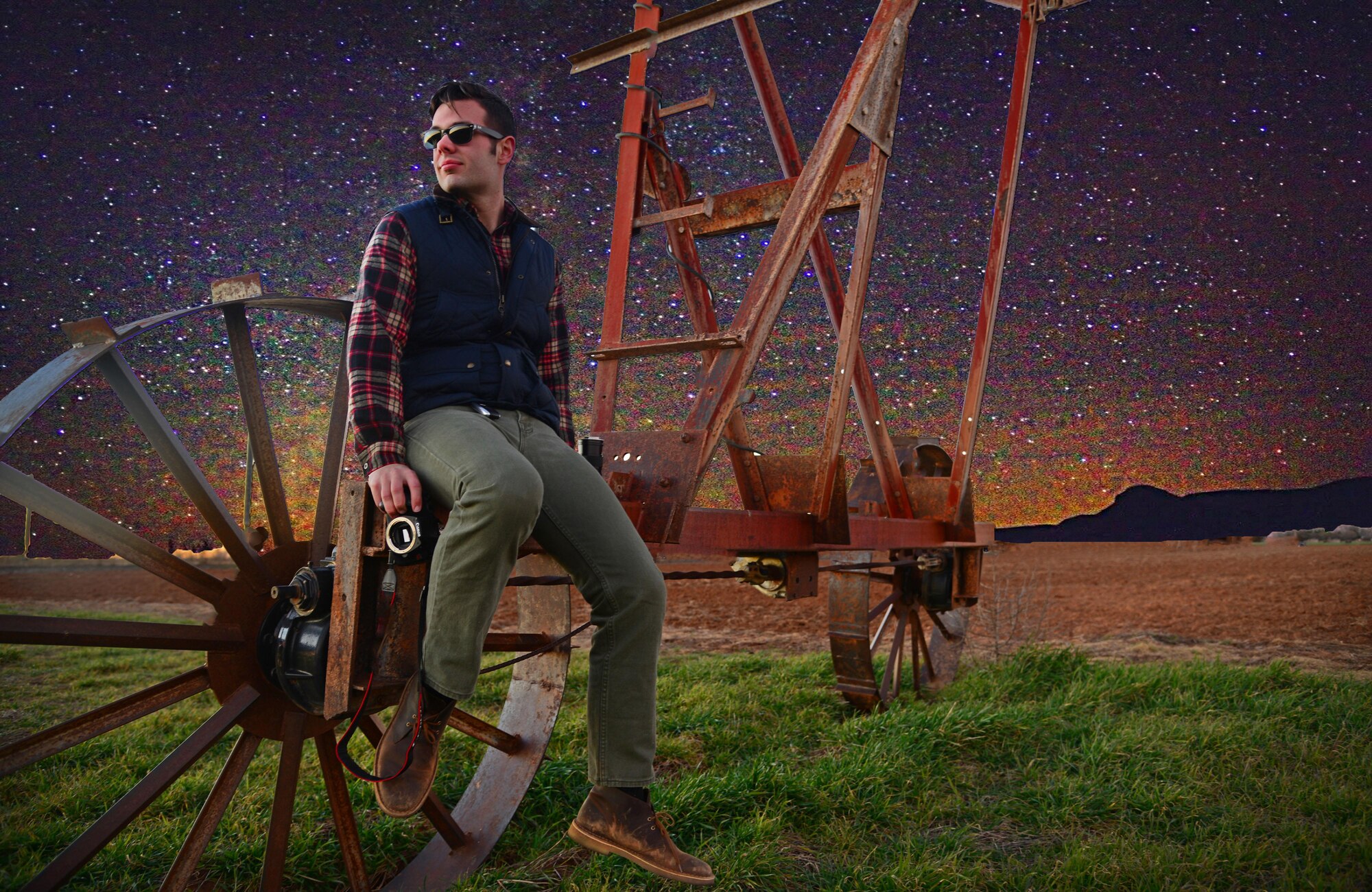 U.S. Air Force Airman 1st Class Ty Temple, 27th Special Operations Logistics Readiness Squadron, gazes off into the distance while sitting in a field Dec. 18, 2015, in Clovis, N.M. Temple is a freelance photographer who enjoys taking classic portraits, capturing landscape and dabbles in astrophotography. (U.S. Air Force photo illustration/Staff Sgt. Alexx Pons) 