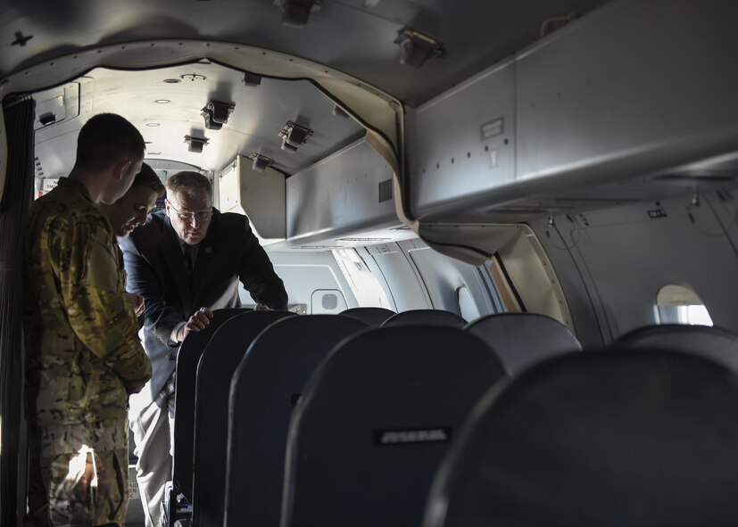 Deputy Secretary of Defense Bob Work speaks with Capt. Joseph Daniele, center, and Airman 1st Class Nicholas Harris, Airmen with the 524th Special Operations Squadron, at Hurlburt Field, Fla., Jan. 6, 2016. The deputy secretary of defense visited Hurlburt to talk with troops and speak to the leadership of Air Force Special Operations Command. (U.S. Air Force photo by Airman 1st Class Kai White)
