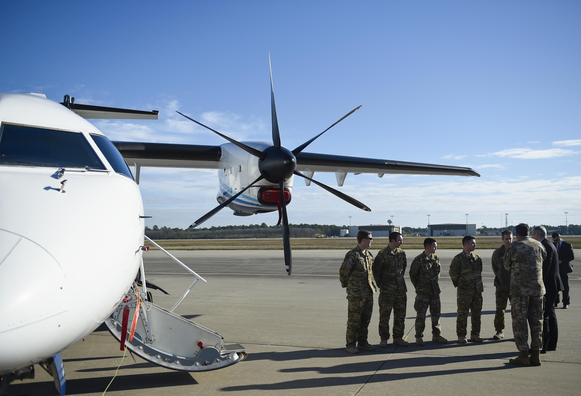 Deputy Secretary of Defense Bob Work meets with Airmen from the 919th Special Operations Wing for a static display of the C-146A Wolfhound at Hurlburt Field, Fla., Jan. 6, 2016. The deputy secretary of defense toured static displays of aircraft from Air Force Special Operations Command. (U.S. Air Force photo by Airman 1st Class Kai White)
