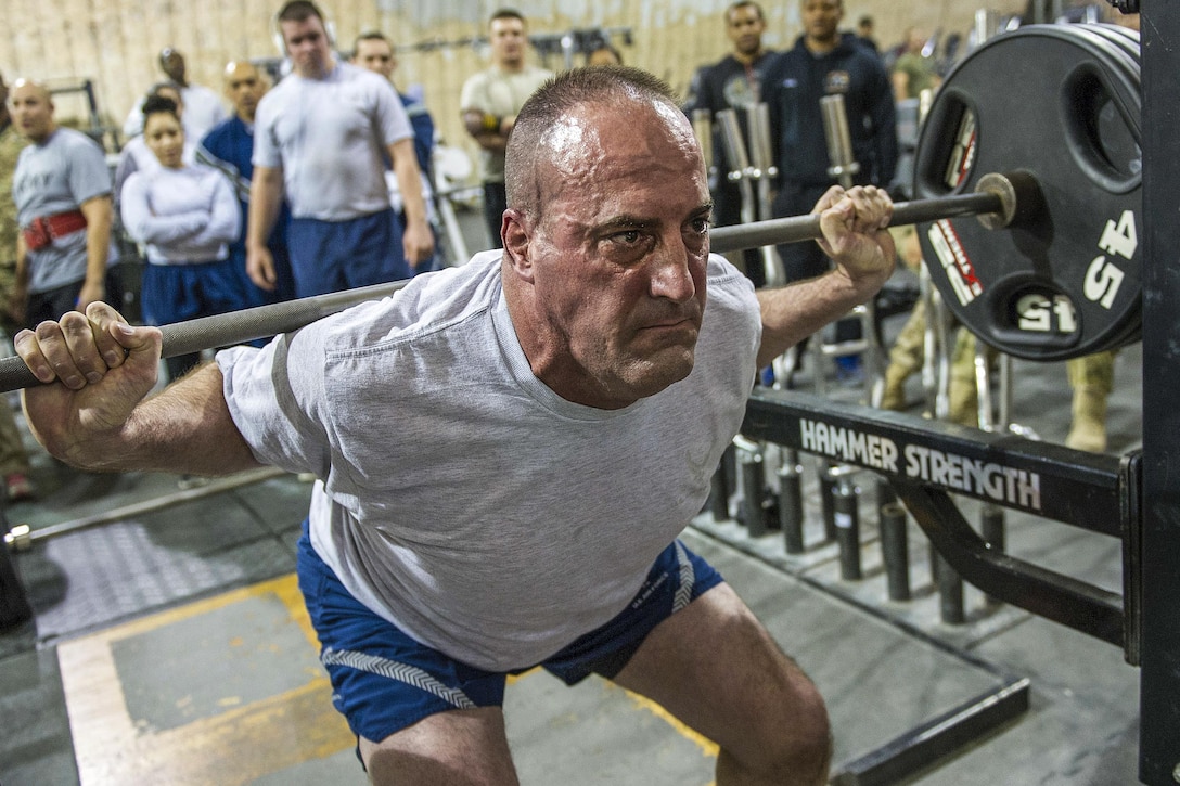 U.S. Army Col. Jeffrey Russell competes in a 400- to 1000-pound powerlifting competition at the Rock Fitness Center on Bagram Airfield, Afghanistan, Jan. 9, 2016. Russell is a commander assigned to the 455th Expeditionary Maintenance Group. U.S. Air Force photo by Tech. Sgt. Robert Cloys 