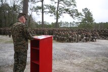 U.S. Navy Capt. Bill Muhm, 2nd Marine Logistics Group chaplain leads the Marines and sailors in prayer during the ribbon cutting ceremony to unveil the newly renovated 2nd MLG Corporals Course facility at Camp Lejeune, N.C., Jan. 6, 2016. The buildings on the site of the new Corporals Course were to be demolished, but were saved for their potential use as a training facility.  (U.S. Marine Corps photo by Lance Cpl. Miranda Faughn/Released)