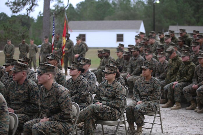 Officers and enlisted Marines and sailors from 2nd Marine Logistics Group gathered to unveil the new Corporals Course training center, now open for use at Camp Lejeune, N.C., Jan. 6, 2016. Brig. Gen. Charles Chiarotti, the commanding general for 2nd Marine Logistics Group spoke with them about the importance of non-commissioned officers and training at all stages of their careers. (U.S. Marine Corps photo by Lance Cpl. Miranda Faughn/Released)