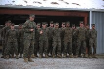 Brig. Gen. Charles Chiarotti, commanding general for 2nd Marine Logistics group, recognizes the group of Marines who helped rebuild the unit’s new Corporals Course facility, during its unveiling at Camp Lejeune, N.C., Jan. 6, 2016. The buildings on the site were supposed to be demolished, but were renovated for their potential to be used as a training facility. (U.S. Marine Corps photo by Lance Cpl. Miranda Faughn/Released)