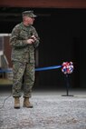 Brig. Gen. Charles Chiarotti, commanding general for 2nd Marine Logistics Group, speaks to the Marines and sailors attending the ribbon cutting ceremony to unveil the new Corporals Course training facility at Camp Lejeune, N.C., Jan. 6, 2016. Chiarotti spoke with them about the importance of non-commissioned officers and training at all stages of their careers.  (U.S. Marine Corps photo by Lance Cpl. Miranda Faughn/Released)