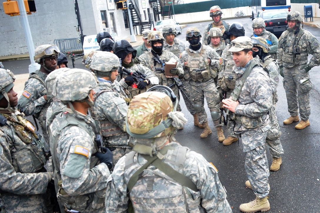 New York Army National Guardsmen receive a safety and mission brief before participating in tactical training at the New York Police Department training facility and range at Rodman's Neck in New York, Jan. 9, 2016. The soldiers are assigned to Alpha Company, 1st Battalion, 69th Infantry. New York Army National Guard photo


