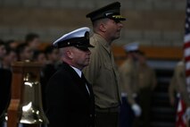 Master Chief Petty Officer Robert Lemons (left), the command master chief of the 1st Marine Division, and Maj. Gen. Daniel O’Donohue (right), commanding general of 1st Mar. Div., stand alongside the ceremonial bell before Lemons’ retirement ceremony aboard Marine Corps Base Camp Pendleton, Calif., Jan. 8, 2015. Lemons enlisted in the U.S. Navy in 1986 and served a majority of his time in the service as a corpsman.