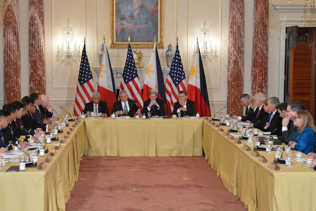 U.S. Defense Secretary Ash Carter and U.S. Secretary of State John Kerry participate in a working lunch with Philippine Foreign Relations Secretary Albert F. Del Rosario and Philippine Defense Secretary  Violtaire T. Gazmin at the U.S. State Department in Washington, D.C., Jan. 12, 2015. State Department photo