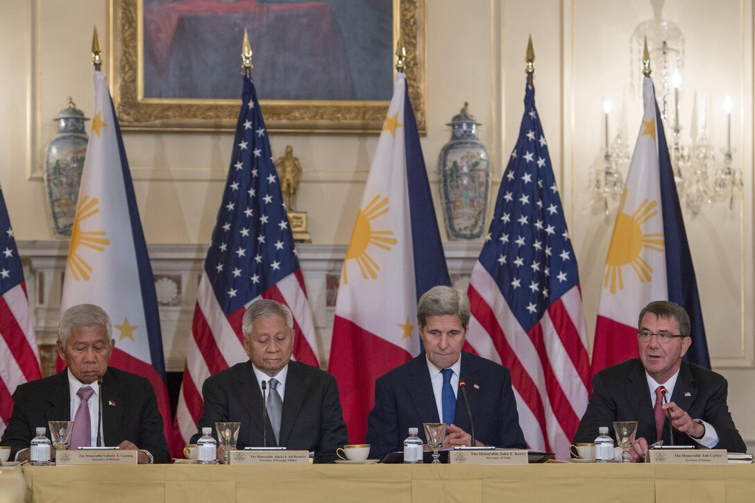 Defense Secretary Ash Carter, right, makes remarks as he and Secretary of State John Kerry meet with Philippine Foreign Secretary Albert del Rosario, center left, and Philippine Defense Secretary Voltaire Gazmin, left, at the State Department in Washington, D.C., Jan. 12, 2016. The leaders met to discuss matters of mutual importance. DoD photo by Air Force Senior Master Sgt. Adrian Cadiz 