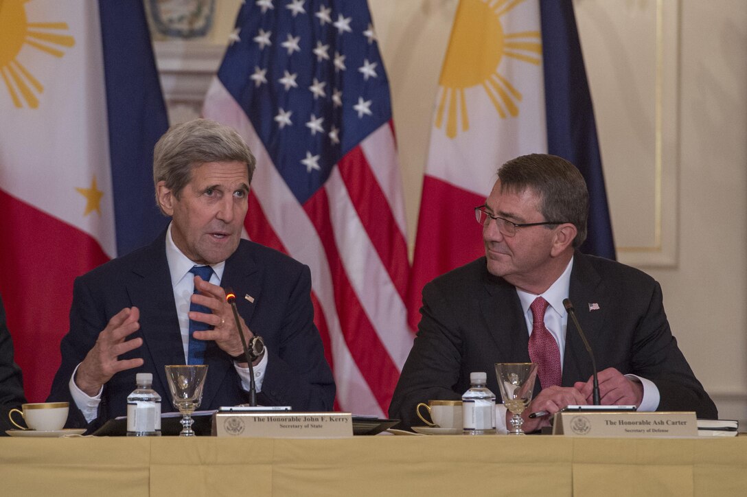 Defense Secretary Ash Carter, right, listens as Secretary of State John Kerry makes remarks during a meeting with Philippine Foreign Secretary Albert del Rosario and Philippine Defense Secretary Voltaire Gazmin at the State Department in Washington, D.C., Jan. 12, 2016. DoD photo by Air Force Senior Master Sgt. Adrian Cadiz