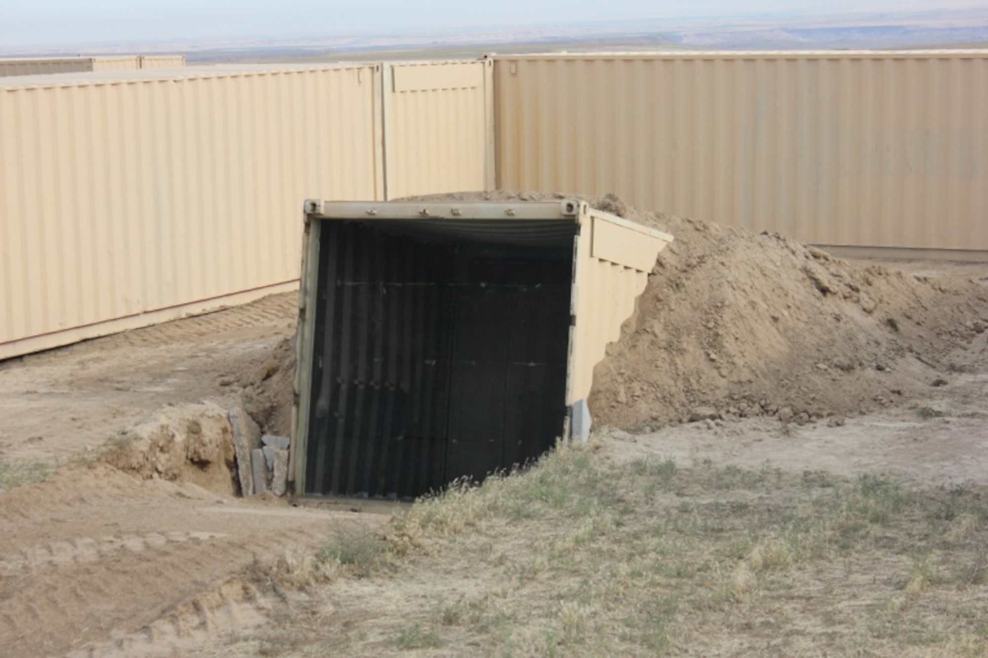 A simulated tunnel entrance is included as part of a mock village at Saylor Creek Range Complex, Idaho. The target entrance was created using a shipping container. (Courtesy photo)