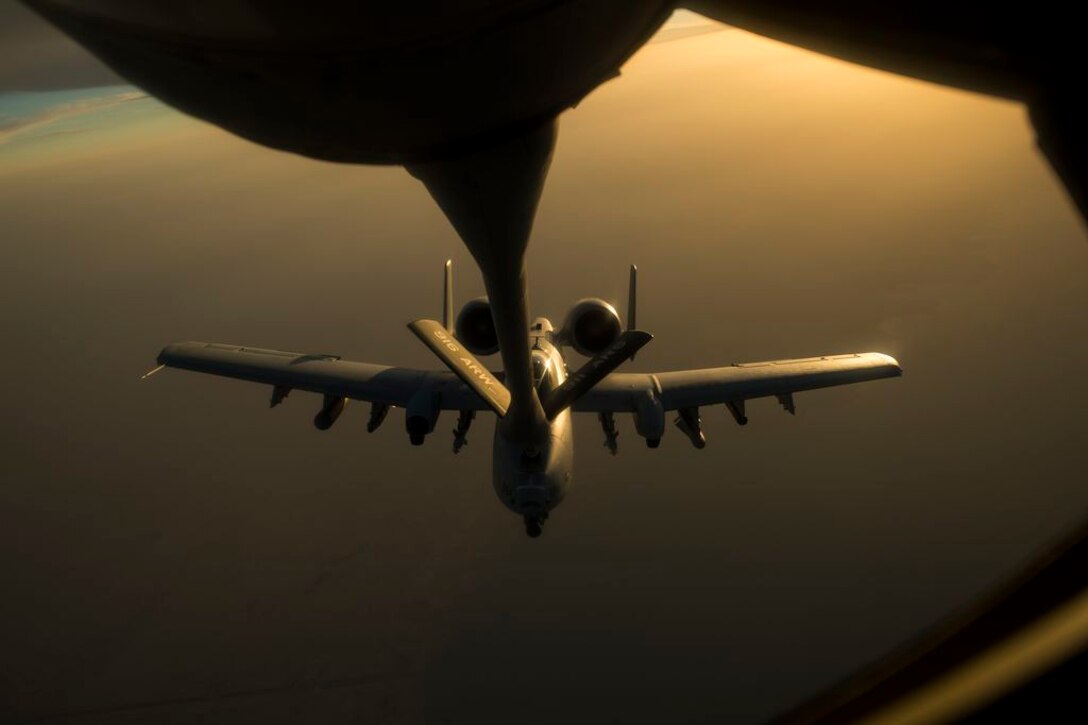 A U.S. Air Force A-10 Warthog, assigned to the 163rd Expeditionary Fighter Squadron, receives fuel from a KC-135 Stratotanker, 340th Expeditionary Aerial Refueling Squadron, over Southwest Asia, Oct. 13, 2015. Coalition forces fly daily missions in support of Operation Inherent Resolve. (U.S. Air Force photo by Senior Airman Taylor Queen/Released)