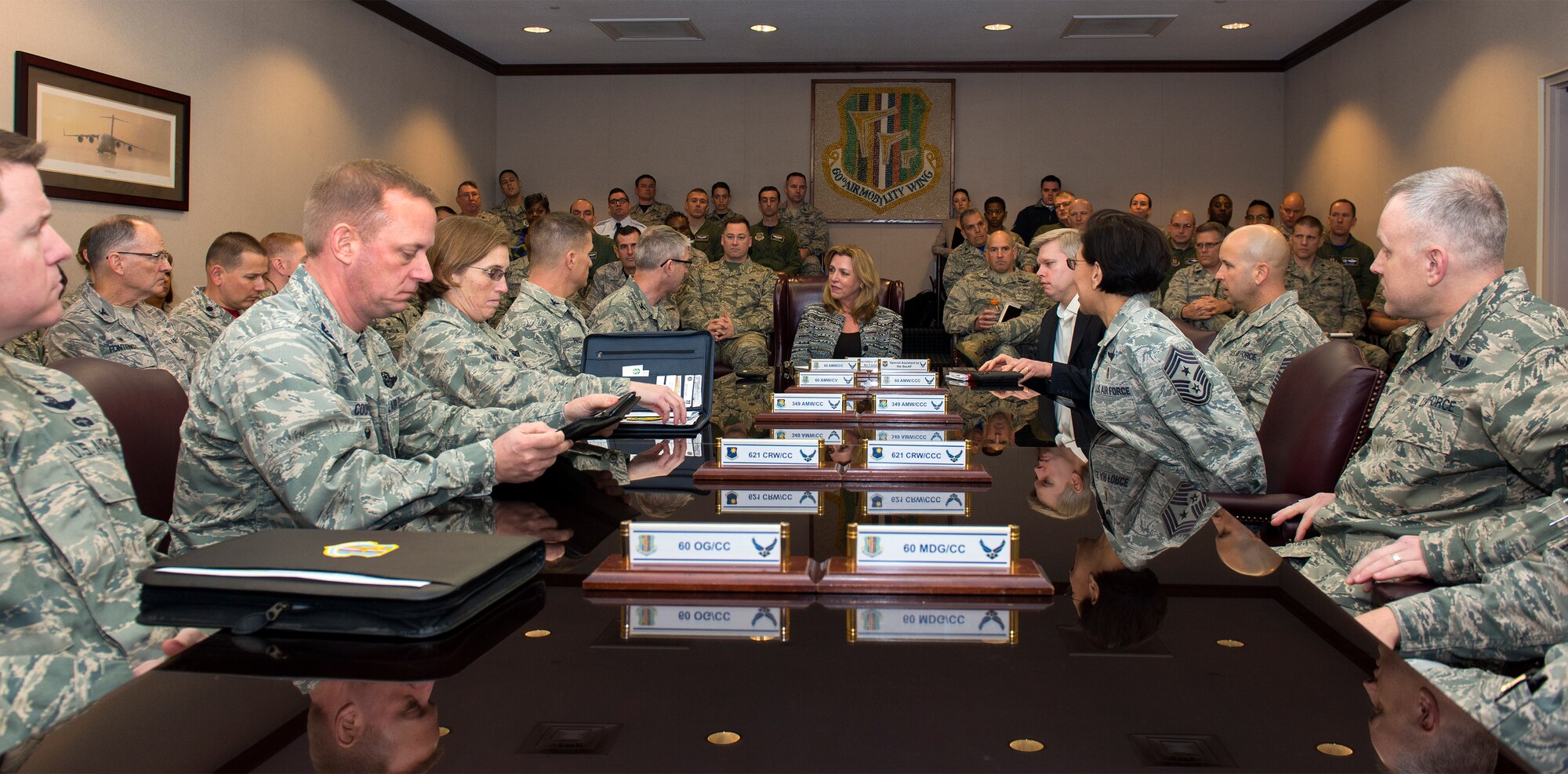 Secretary of the Air Force Deborah Lee James is given a mission brief by senior base leaders Jan. 8, 2016, at Travis Air Force Base, California.  The briefing focused on the cornerstone functions of the installation such as the seamless Total Force integration of three separate wings, the employment of three major mobility weapons systems and Travis’ strategic location serving as the lifeline to the Pacific theater. (U.S. Air Force photo by Heide Couch)