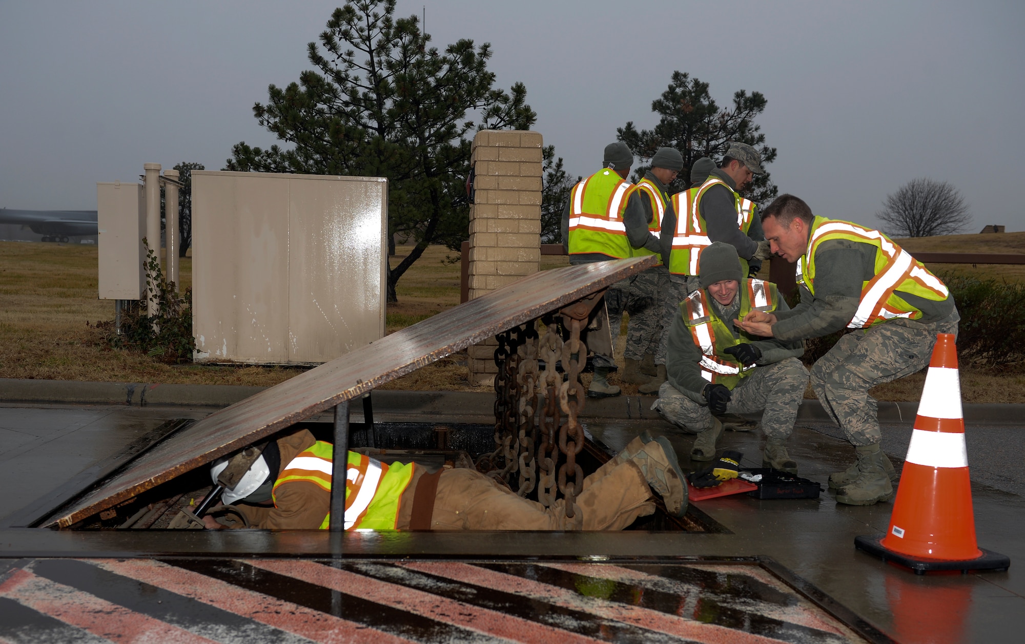 Members of the 22nd Civil Engineer Squadron electrical power production shop, trouble-shoot a road barrier, Jan. 7, 2016, at McConnell Air Force Base, Kan. The 22nd CES Airmen are required to perform routine checks every month.  (U.S. Air Force photo/Senior Airman Colby L. Hardin)

