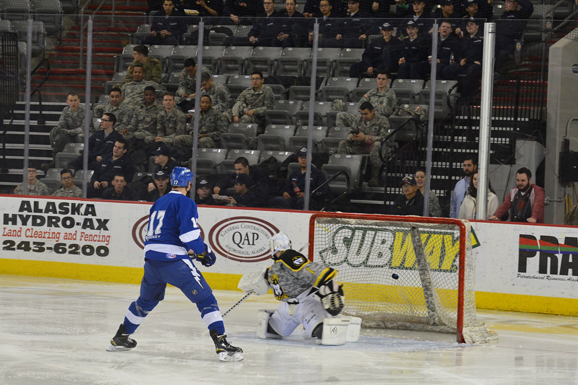 A player from Joint Base Elmendorf-Richardson's U.S. Air Force hockey team scores their second goal on the Army during the JBER Air Force vs. Army hockey match at the Sullivan Arena Jan 9. The Army came back from a 4-1 point deficit to win the game in a shoot-out and a final score of 7-6. (Air Force photo by Airman 1st Class Kyle Johnson/Released)