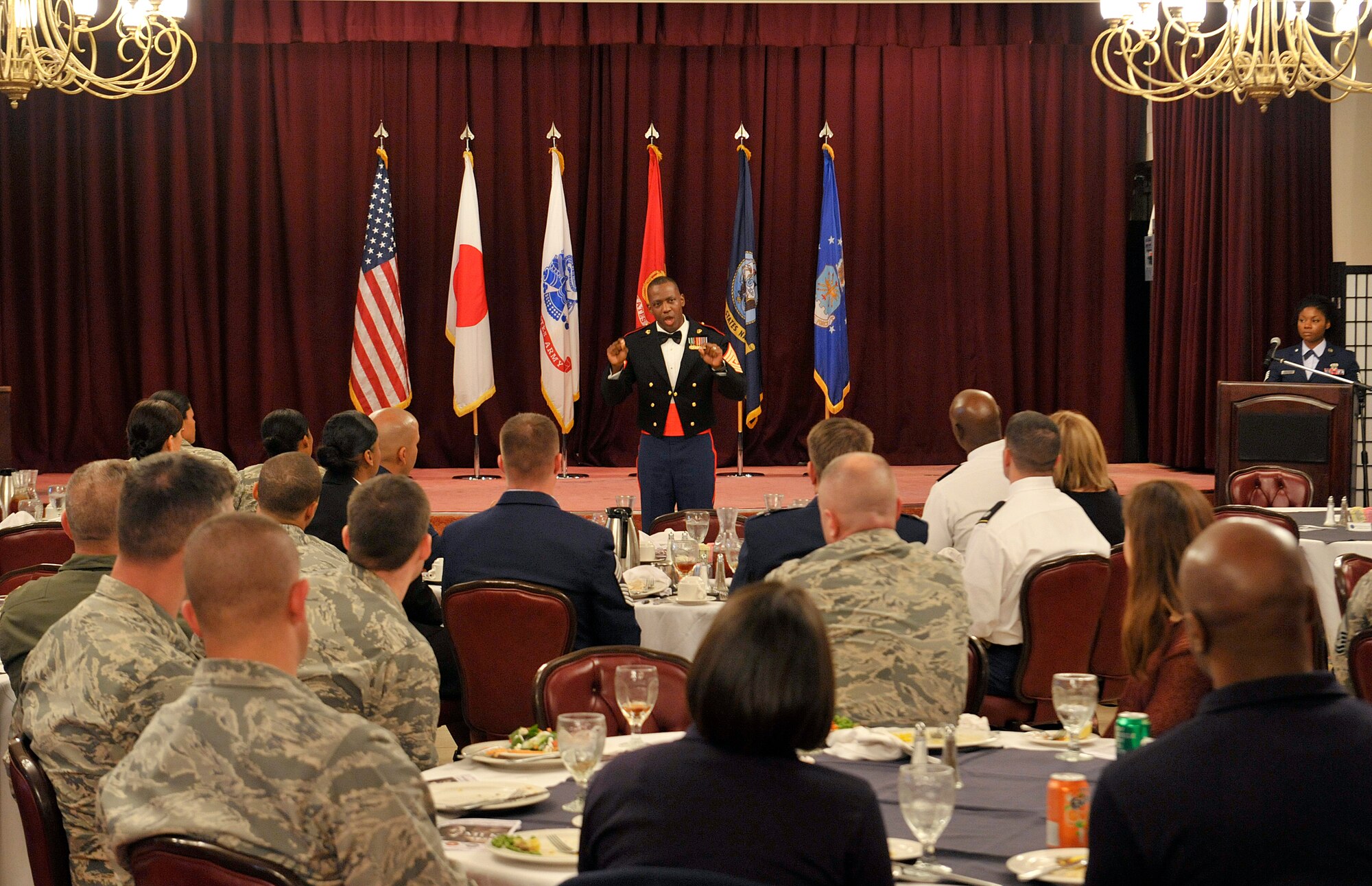 Guest speaker, U.S. Army 1st Sgt. Oranjel Leavy, Headquarters and Support Company 1st Sgt, talks about Dr. King's stance on human rights and his inspiration to attendees at the Kadena Officers' Club, Jan. 12, 2016, at Kadena Air Base, Japan. MLK Day is an American federal holiday marking the birthday of Martin Luther King Jr. It is observed on the third Monday of January each year, which is around King's birthday, January 15. (U.S. Air Force photo by Naoto Anazawa)