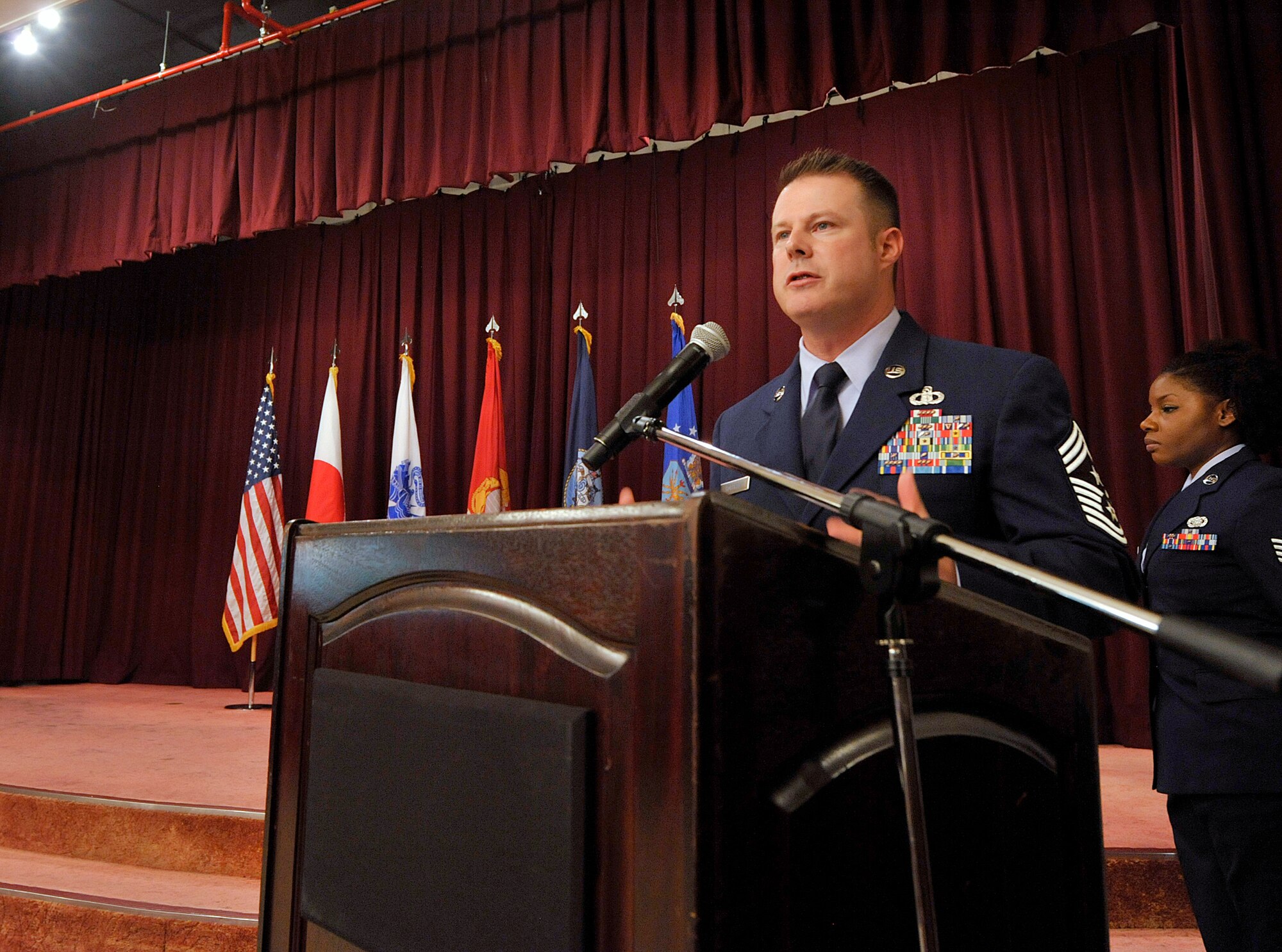 U.S. Air Force Chief Master Sgt. Charles Hoffman, 18th Wing command chief, speaks to approximately 100 people during the annual Dr. Martin Luther King Jr. Day memorial luncheon at the Kadena Officers' Club, Jan. 12, 2016, at Kadena Air Base, Japan. On Jan. 18, America will observe Dr. Martin Luther King Jr.' s contribution, dedication, and leadership. (U.S. Air Force photo by Naoto Anazawa)