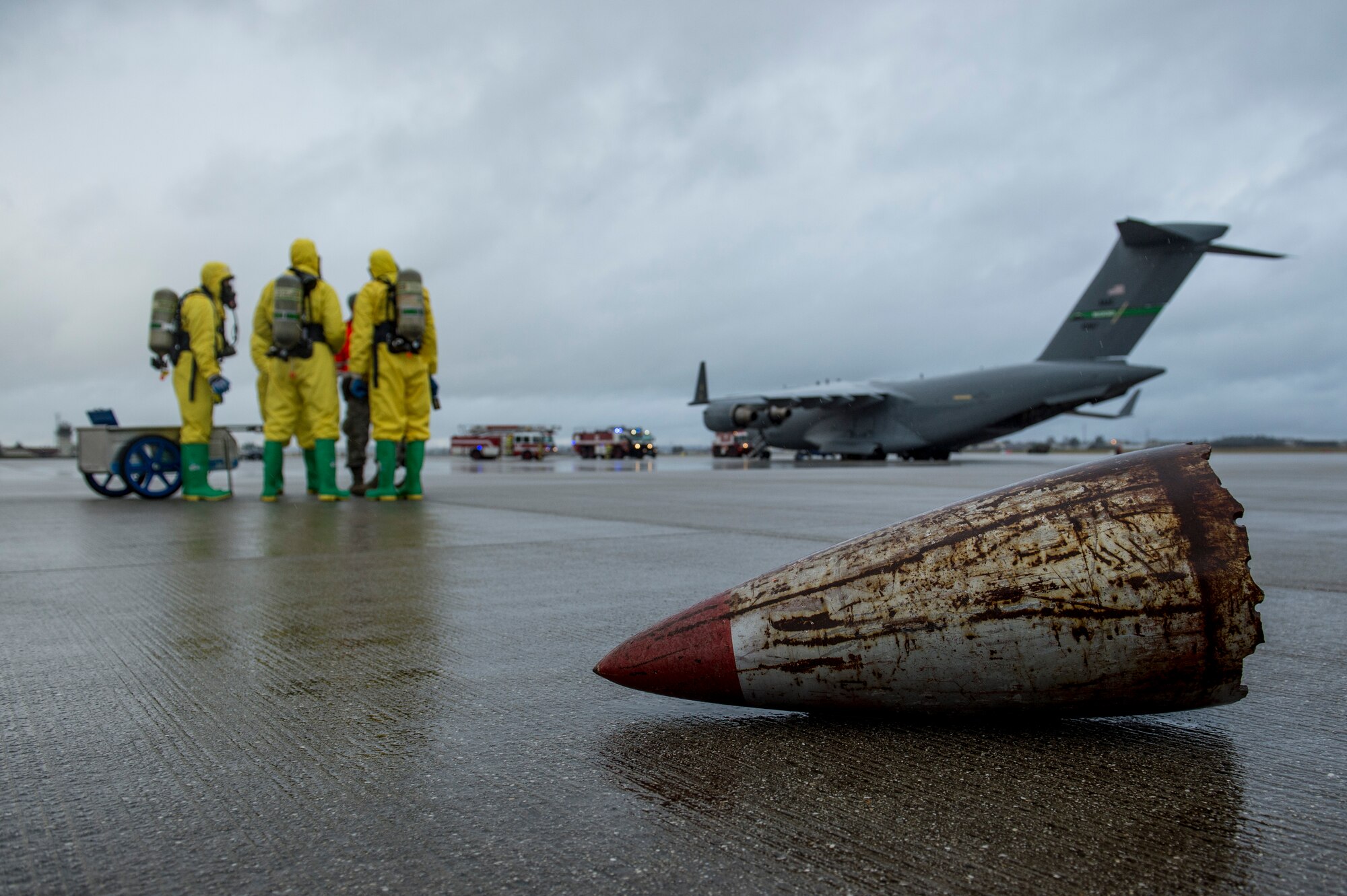 A dummy shell rests on the flightline as emergency response Airmen participate in training at Spangdahlem Air Base, Germany, Jan. 11, 2016. The exercise incorporated a range of base agencies to include the fire department, security forces, airfield operations and explosive ordnance disposal flight. (U.S. Air Force photo by Senior Airman Rusty Frank/Released)
