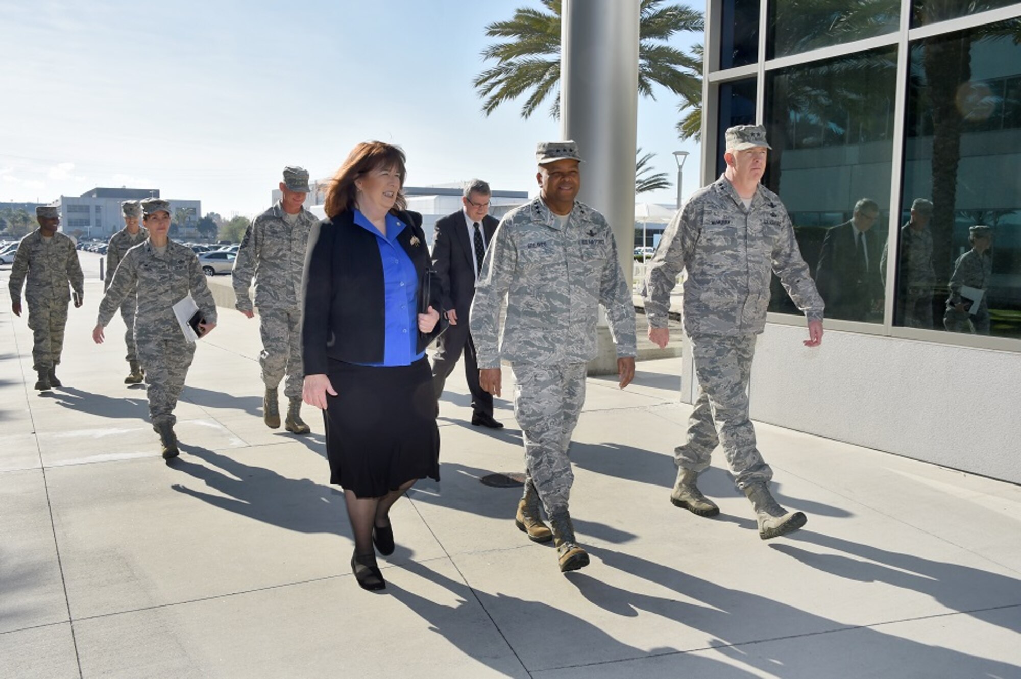 The Honorable Suzanne Fuentes, Mayor of El Segundo, Calif., is escorted by Lt. Gen. Samuel Greaves, Space and Missile Systems Center commander and Air Force program executive officer for space and Maj. Gen. Robert McMurry, SMC vice commander, during the mayor’s visit to Los Angeles Air Force Base Dec. 21, 2015 for an office call and SMC briefing. Col. Donna Turner, 61st Air Base Group commander, Chief Master Sgt. Craig Hall, SMC command chief and Tom Fitzgerald, acting SMC executive director, follow in attendance. (U. S. Air Force photo/Joseph Juarez, Sr.)