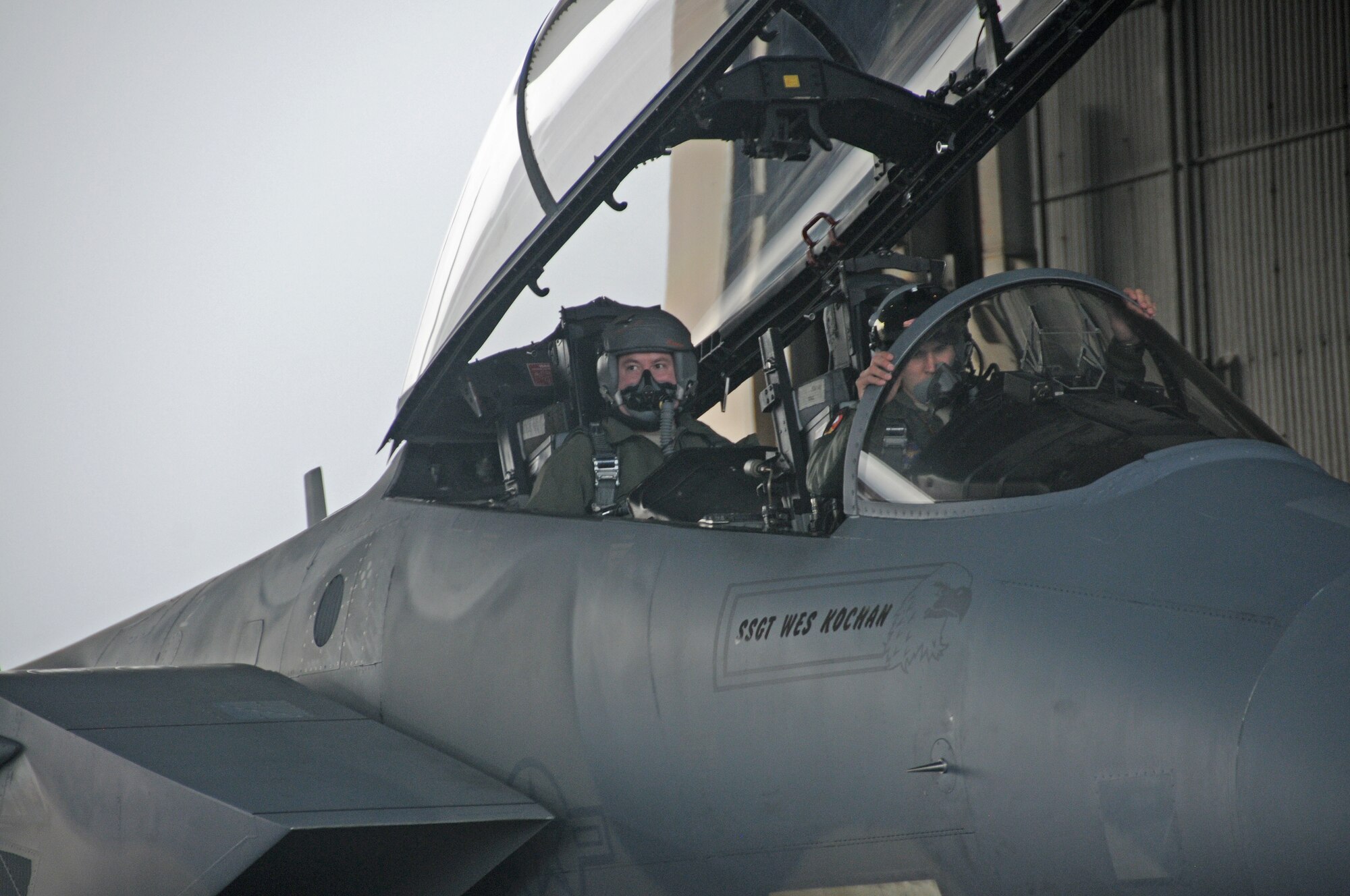 1st Lt. Scott McGowen sits in the cockpit of a waiting F-15 aircraft while preparing to make his first flight at the controls of the Eagle, Dec. 10, 2015. His instructor pilot Maj. Victor Knill, will ride in the backseat to ensure safety and provide feedback upon landing. (U.S. Air National Guard photo by Tech. Sgt. Jefferson Thompson)