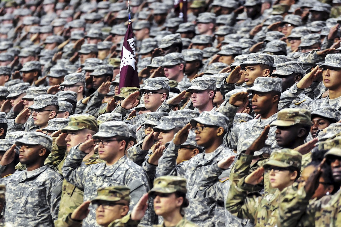 Soldiers salute the colors before the 2016 All-American Bowl in San Antonio, Jan. 9, 2016. The soldiers are assigned to Fort Sam Houston. U.S. Army Photo by Sgt. Bethany L. Huff
