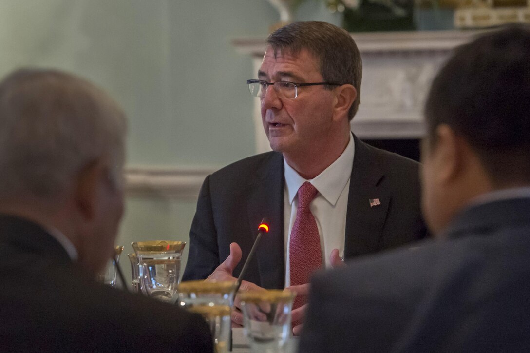 Defense Secretary Ash Carter speaks with Philippine Foreign Secretary Albert del Rosario and Philippine Defense Secretary Voltaire Gazmin during a working lunch at the State Department. Jan. 12, 2016. The leaders met to discuss matters of mutual importance. DoD photo by Air Force Senior Master Sgt. Adrian Cadiz