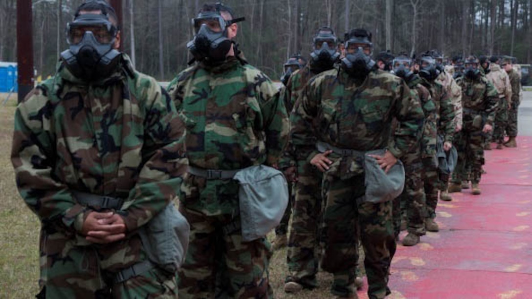 II Marine Expeditionary Force Marines with II Marine Headquarters Group and Combat Logistics Battalion 24 wait before entering the gas chamber at Marine Corps Base Camp Lejeune, N.C., Jan. 8, 2016. As of fiscal year 2015, Marines qualify bi-annually in preparation for deployment. The chamber is a routine exercise to ensure the durability of each Marines gear while exposed to chlorobenzylidene malononitrile, or CS gas.