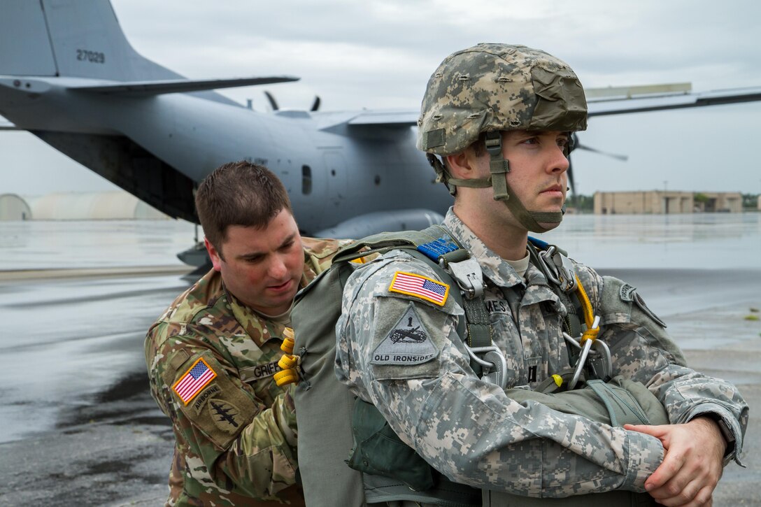 An Army jumpmaster inspects a soldier's equipment before an airborne operation over Homestead Air Reserve Base, Fla., Jan. 12, 2016. U.S. Army photo by Staff Sgt. Osvaldo Equite