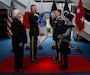 Army Maj. Gen. James F. Pasquarette (left), commanding general, U.S. Army Japan, conducts the Oath of Commissioned Officers to newly promoted Army 2nd Lt. Riki R. Riordan (right), signal officer, 311th Signal Command, during a direct commission ceremony held Jan. 6, 2016, in Camp Zama, Japan. The ceremony was one of the first of its kind to take place within U.S. Army Japan as Riordan, a former sergeant first class in the Army Reserve and current Department of Army civilian working at USARJ's G3 (plans/operation) section, earned his rank without having first graduated from a U.S. military academy, Officer Candidate School or Reserve Officer Training Corps program. Direct commissions are typically only offered to enlisted Soldiers seeking a commission in the Army Reserve. Born and raised in Tokyo, Riordan enlisted in the Army in 2001 and served as a cavalry scout. Riordan transitioned to the Army Reserve in 2003 and continued to serve his country as a drill sergeant and, later, as a Contingency Acquisition Support Model subject matter expert for U.S. Army Japan. (U.S. Army photo by Army Sgt. John L. Carkeet IV, U.S. Army Japan)