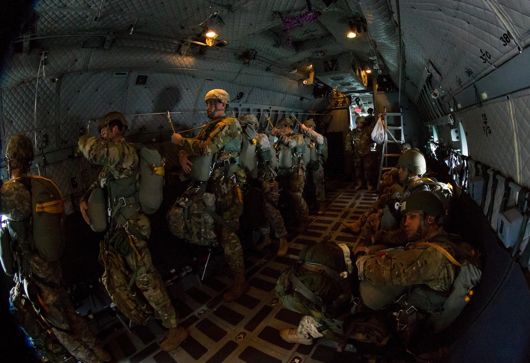 Soldiers wait for the green light during an airborne operation over Homestead Air Reserve Base, Fla., Jan. 12, 2016. U.S. Army photo by Staff Sgt. Osvaldo Equite