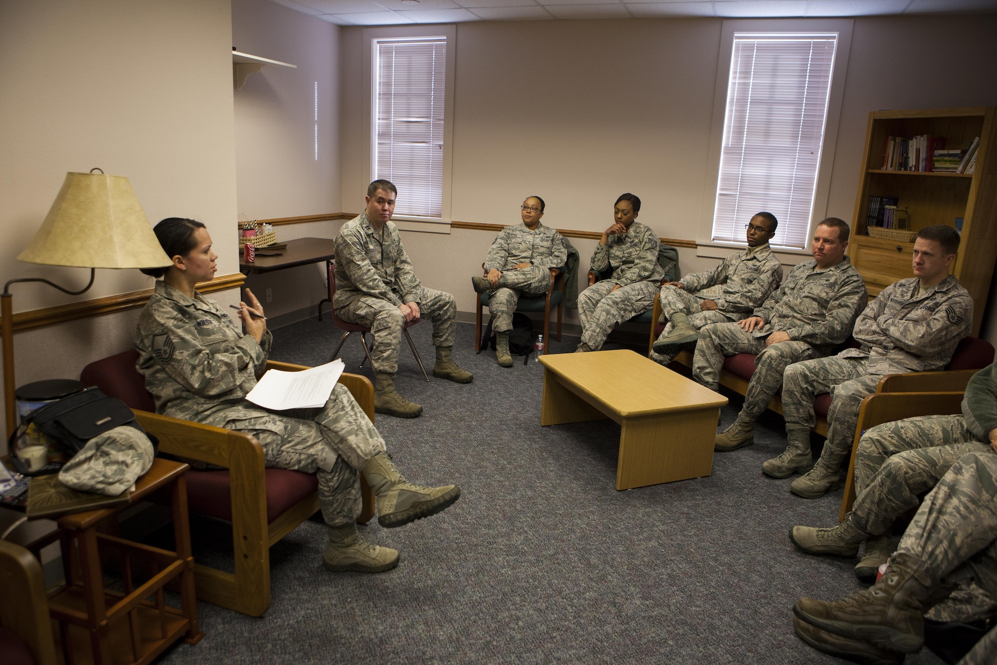 MSgt. Gloria Wilson, 90th Missile Wing Public Affairs superintendant, discusses a safety scenario with a group of wing staff personnel on F.E. Warren Air Force Base, Wyo., Jan. 11, 2016, during a 20th Air Force Safety Down-Day. The down day was part of a 20th Air Force wide initiative to reinforce safety as a high priority. (U.S. Air Force photo by Lan Kim)