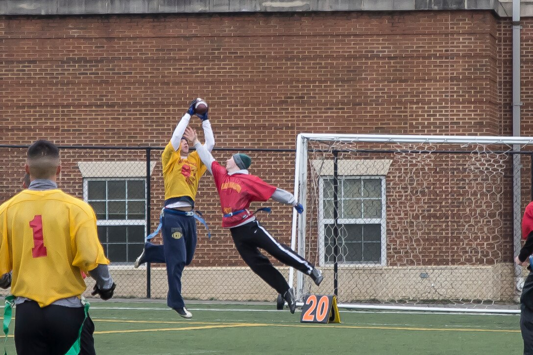 Marines from Alpha and Guard Companies, participate in the intramural Flag Football Championship at Marine Barracks Washington, D.C., Annex field, Jan. 7, 2016. Annually, six companies throughout the Barracks will enter a team to participate in this event. The champions of this year’s game were the Marines from A Co. (Official Marine Corps photos by Cpl. Chi Nguyen/Released)