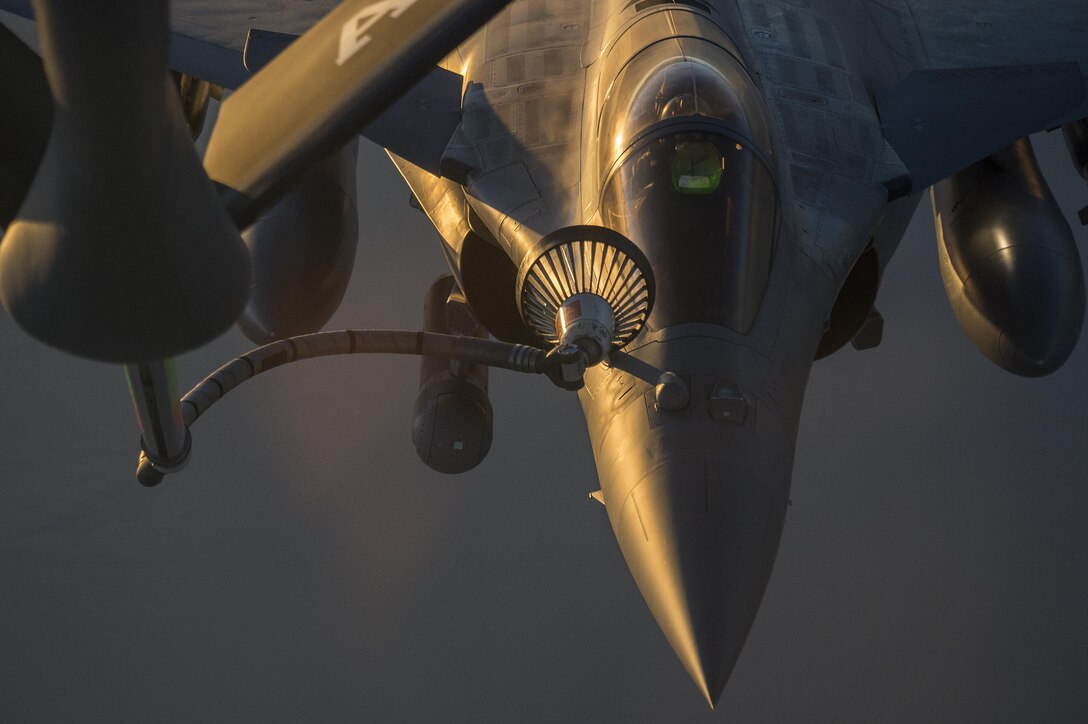 A U.S. Air Force KC-135 Stratotanker refuels a French F-2 Rafale over Iraq in support of Operation Inherent Resolve, Jan. 8, 2016. The aircraft crew is assigned to the 340th Expeditionary Air Refueling Squadron. U.S. Air Force photo by Tech. Sgt. Nathan Lipscomb