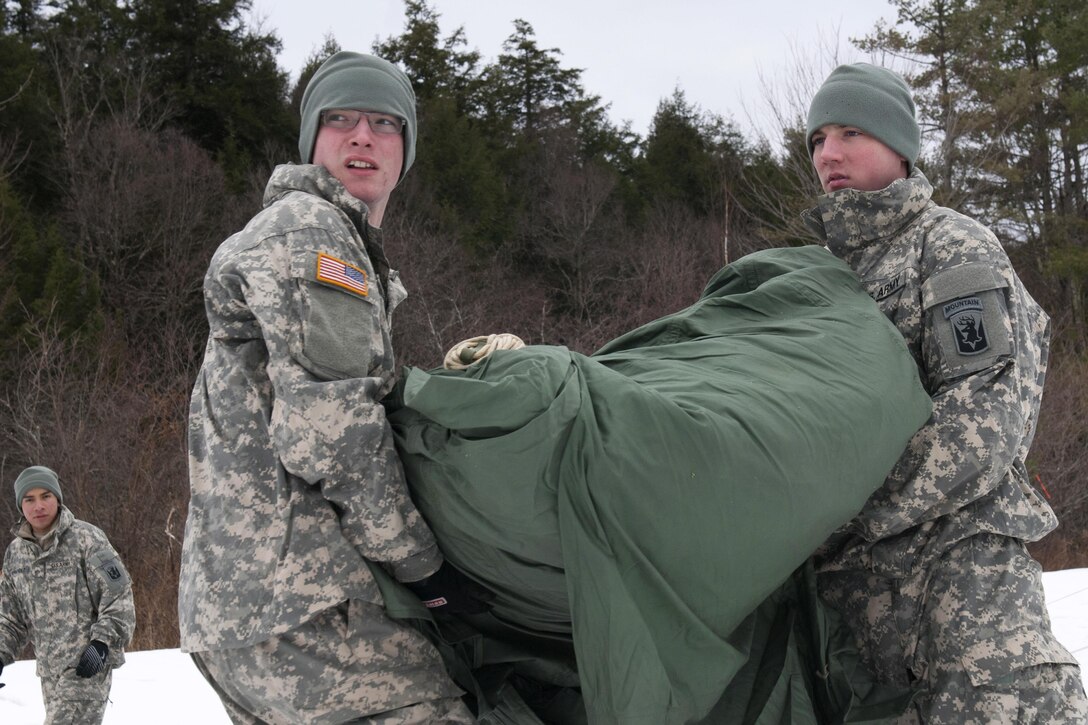 National Guardsmen prepare tents for a night stay during training at Camp Ethan Allen Training Site in Jericho, Vt., Jan. 9, 2016. Vermont Army National Guard photo by Spc. Avery Cunningham