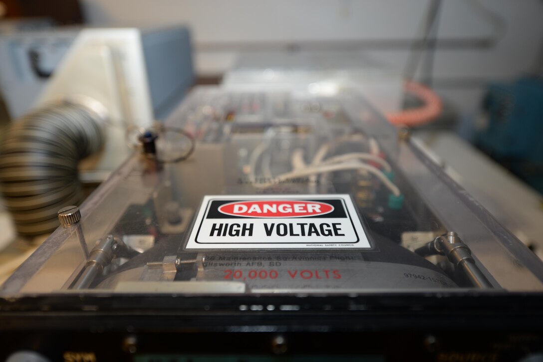 A radar target indicator unit displays a warning sign at Ellsworth Air Force Base, S.D., Jan. 6, 2016. Personnel handle the unit when calibrating the monitor to make sure the image display is not skewed or warped. (U.S. Air Force photo by Airman Sadie Colbert/Released)