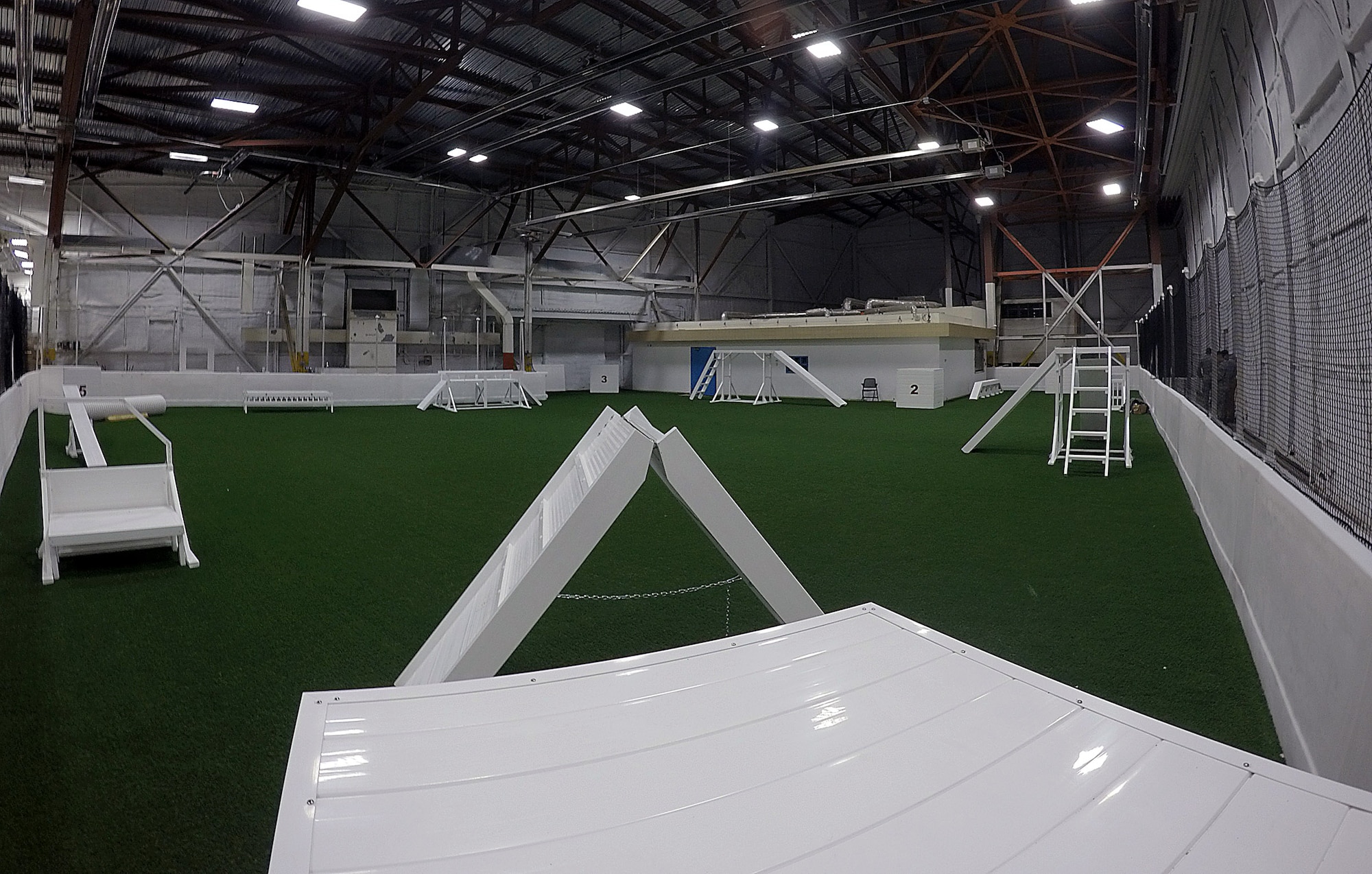 The new indoor military working dog training facility is ready for use at Ellsworth Air Force Base, S.D., Dec. 30, 2015. The building, a renovated aircraft hangar, allows obstacle course and patrol and detection training to be conducted in a safe environment. (U.S. Air Force photo/Airman 1st Class James L. Miller)