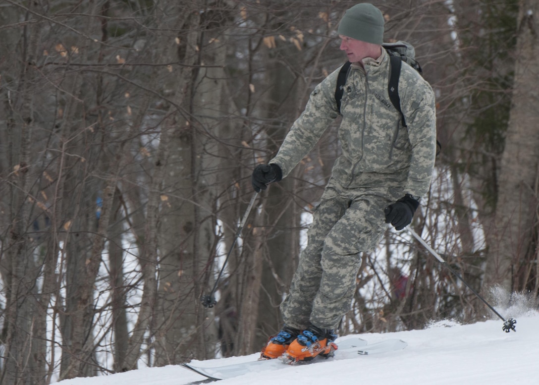 A Vermont National Guardsman skis down the mountain during training at Bolton Valley Resort in Bolton, Vt., Jan. 9, 2016. Vermont Army National Guard photo by Spc. Avery Cunningham