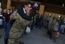 Air Commandos are reunited with family members and friends during Operation Homecoming at the Deployment Control Center on Hurlburt Field, Jan. 13, 2016. Operation Homecoming brought approximately 80 Airmen home from their deployment overseas.  (U.S. Air Force photo by Senior Airman Ryan Conroy)