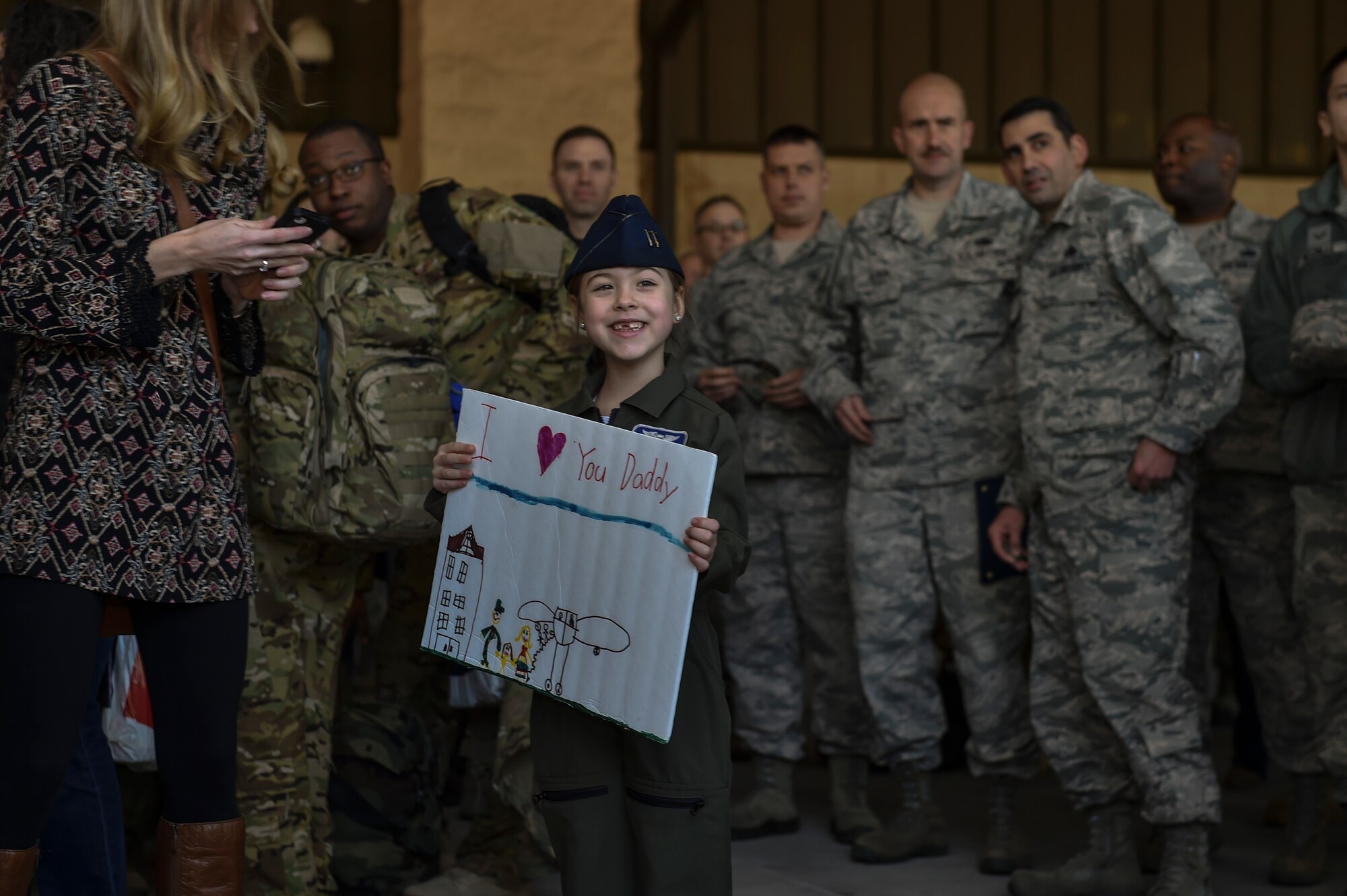 Air Commandos are reunited with family members and friends during Operation Homecoming at the Deployment Control Center on Hurlburt Field, Jan. 13, 2016. Operation Homecoming brought approximately 80 Airmen home from their deployment overseas.  (U.S. Air Force photo by Senior Airman Ryan Conroy) 